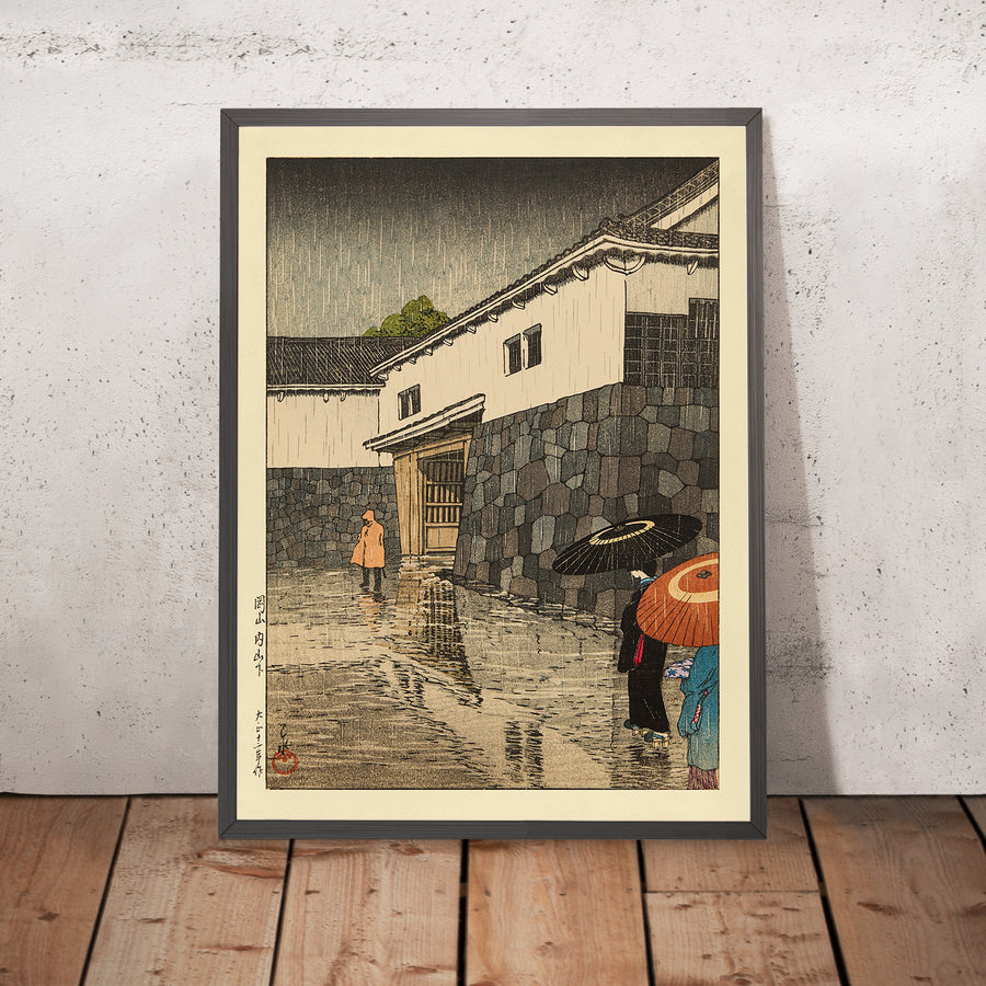 A framed image of Uchiyamashita in the Rain by Hasui Kawase 1935