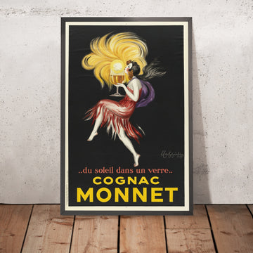 A framed image of Cognac Monnet Vintage Cognac Poster by Leonetto Cappiello, 1927