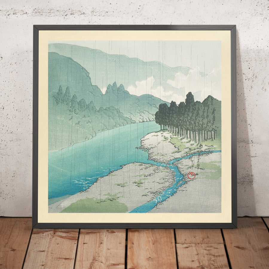 A framed image of Okutama in the Rain by Hasui Kawase, 1935